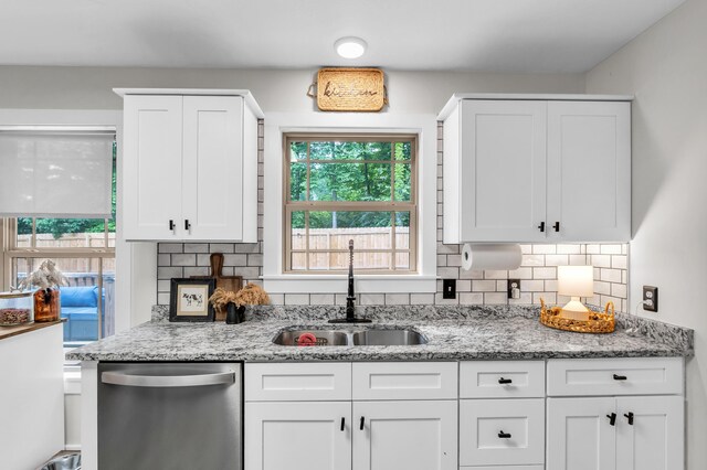 329 Windsong Dr, Lafayette, GA 30728 - kitchen with dishwasher, a sink, tasteful backsplash, and white cabinetry