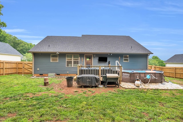 329 Windsong Dr, Lafayette, GA 30728 - back of property with a wooden deck, crawl space, and roof with shingles