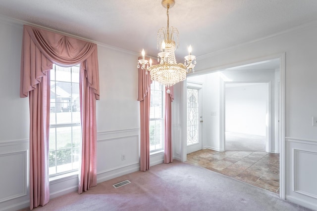 8275 Stillwater Cir, Ooltewah, TN 37363 - unfurnished dining area featuring a chandelier, carpet, ornamental molding, and a textured ceiling