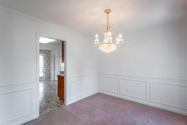 8275 Stillwater Cir, Ooltewah, TN 37363 - spare room with a chandelier, ornamental molding, carpet, a wainscoted wall, and a decorative wall