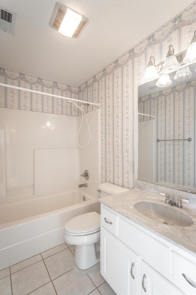 8275 Stillwater Cir, Ooltewah, TN 37363 - full bath featuring vanity, bathing tub / shower combination, toilet, tile patterned floors, and a textured ceiling