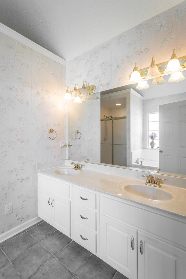 8275 Stillwater Cir, Ooltewah, TN 37363 - full bathroom featuring wallpapered walls, double vanity, a stall shower, tile patterned floors, and baseboards
