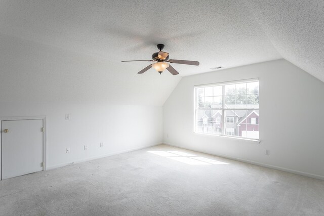 8275 Stillwater Cir, Ooltewah, TN 37363 - bonus room with lofted ceiling, carpet flooring, ceiling fan, a textured ceiling, and baseboards