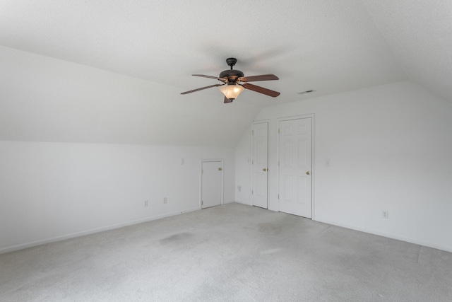 8275 Stillwater Cir, Ooltewah, TN 37363 - bonus room with lofted ceiling, a ceiling fan, light carpet, and baseboards