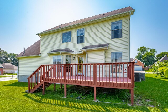 8275 Stillwater Cir, Ooltewah, TN 37363 - rear view of property featuring a wooden deck and a lawn