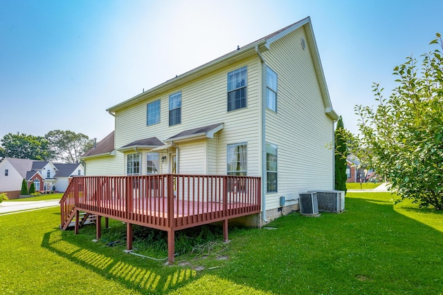 8275 Stillwater Cir, Ooltewah, TN 37363 - back of property with a wooden deck, a lawn, and central AC