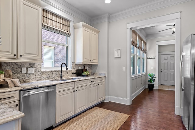 8580 Festival Loop, Chattanooga, TN 37419 - kitchen featuring stainless steel appliances, a sink, tasteful backsplash, plenty of natural light, and crown molding