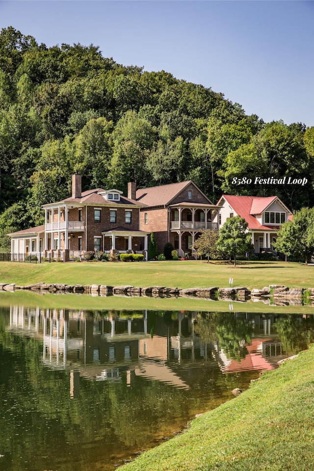 8580 Festival Loop, Chattanooga, TN 37419 - back of house featuring a water view, a chimney, and a lawn