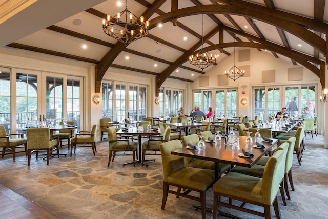 8580 Festival Loop, Chattanooga, TN 37419 - dining space featuring high vaulted ceiling, french doors, stone floors, beamed ceiling, and recessed lighting