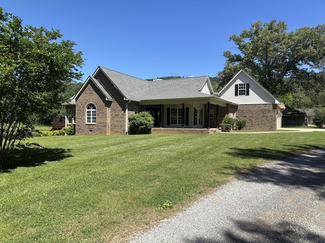 12466 Alabama Hwy, Ringgold, GA 30736 - view of front of house with brick siding, a front lawn, and gravel driveway