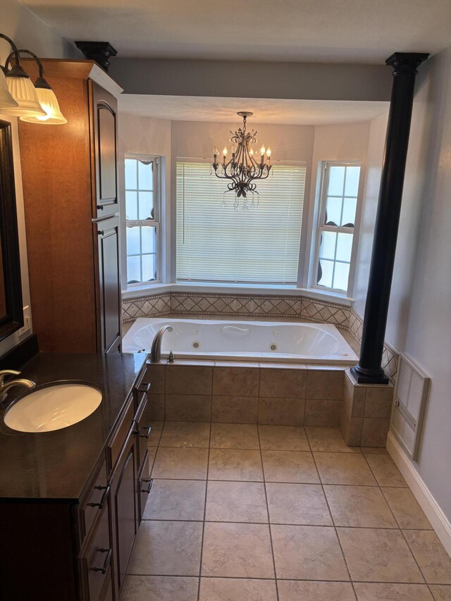 12466 Alabama Hwy, Ringgold, GA 30736 - bathroom with healthy amount of natural light, a jetted tub, a chandelier, and vanity