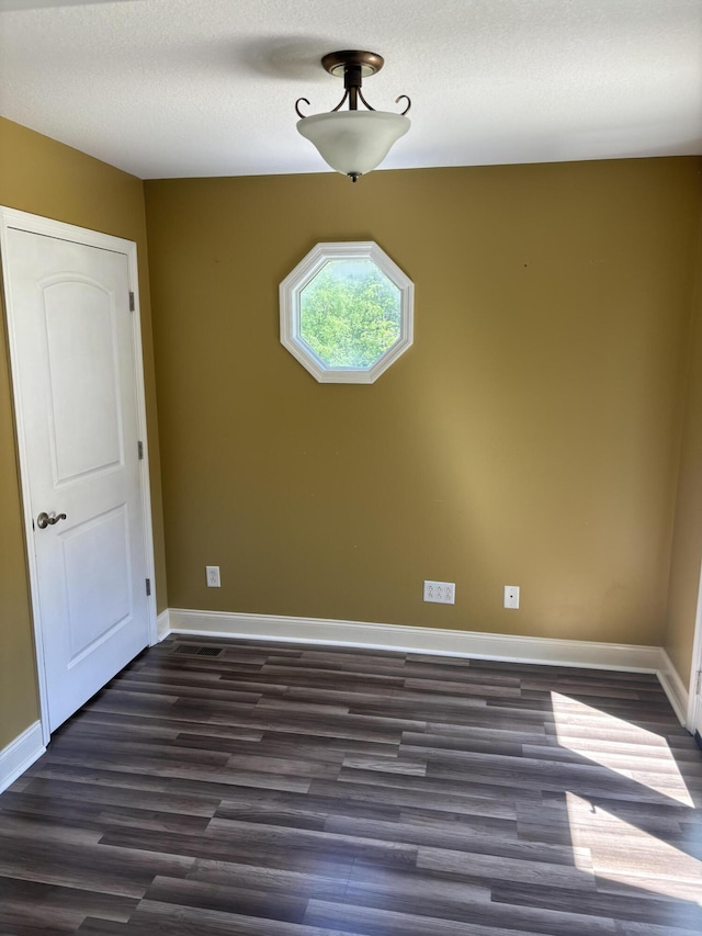 12466 Alabama Hwy, Ringgold, GA 30736 - unfurnished room featuring dark wood-style floors and baseboards
