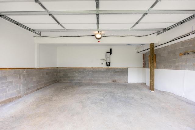 306 Stonegate Way, Soddy Daisy, TN 37379 - garage featuring concrete block wall and a garage door opener