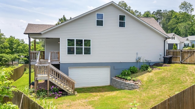 306 Stonegate Way, Soddy Daisy, TN 37379 - rear view of property featuring a garage, stairway, a fenced backyard, roof with shingles, and driveway