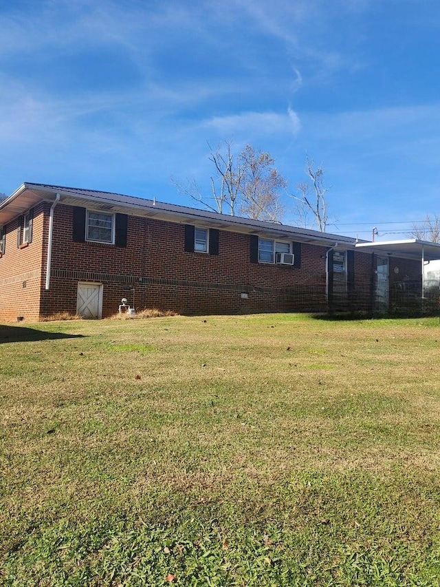 212 S Oak St, Whitwell, TN 37397 - view of front of home with brick siding and a front lawn