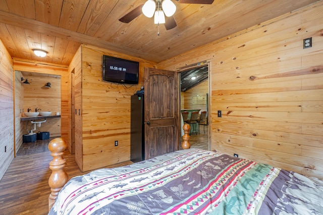253 Hartline Rd, Trenton, GA 30752 - bedroom featuring wooden walls, wood ceiling, a sink, wood finished floors, and a ceiling fan