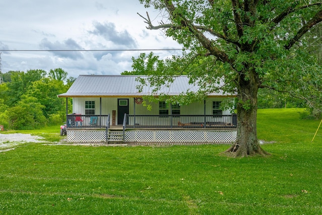 253 Hartline Rd, Trenton, GA 30752 - view of front facade featuring a front yard, metal roof, and covered porch