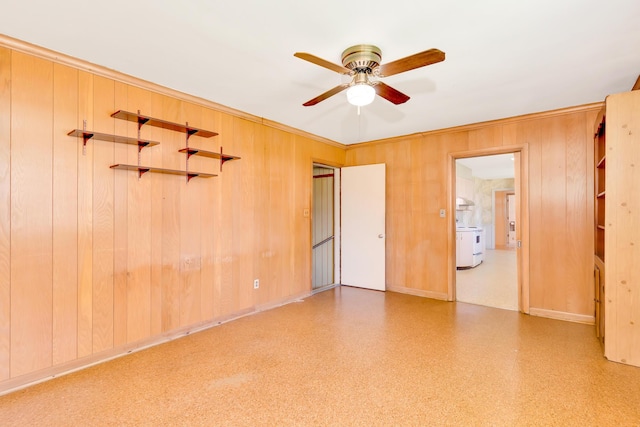 208 Barbara Ln, Chattanooga, TN 37411 - unfurnished bedroom featuring wood walls, crown molding, baseboards, and a ceiling fan
