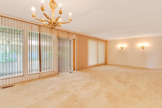 208 Barbara Ln, Chattanooga, TN 37411 - empty room featuring a chandelier, carpet flooring, and a baseboard radiator