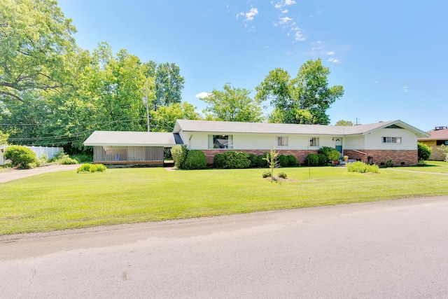 208 Barbara Ln, Chattanooga, TN 37411 - ranch-style house with a front yard, brick siding, and driveway