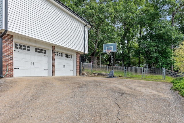 6443 Olde Ferry Lndg, Harrison, TN 37341 - garage featuring asphalt driveway