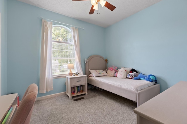 6443 Olde Ferry Lndg, Harrison, TN 37341 - carpeted bedroom featuring a textured ceiling, a ceiling fan, and baseboards