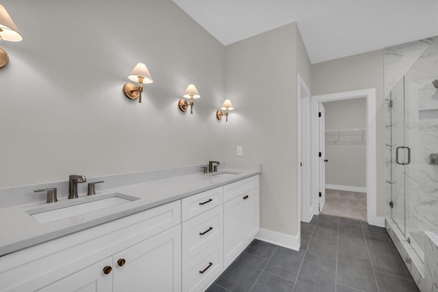 2732 Butlers Green Cir Unit 27, Chattanooga, TN 37421 - full bath featuring a marble finish shower, a spacious closet, double vanity, and baseboards