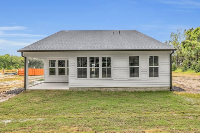 2732 Butlers Green Cir Unit 27, Chattanooga, TN 37421 - rear view of property with a patio, a lawn, and a shingled roof