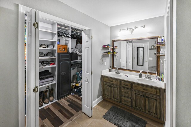 320 Marble Top Rd, Chickamauga, GA 30707 - bathroom with double vanity, tile patterned flooring, and a spacious closet