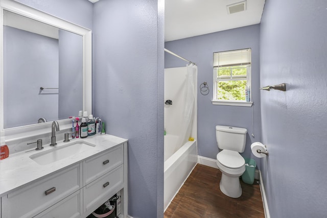 320 Marble Top Rd, Chickamauga, GA 30707 - full bath with toilet, wood finished floors, vanity, baseboards, and shower / bath combo with shower curtain
