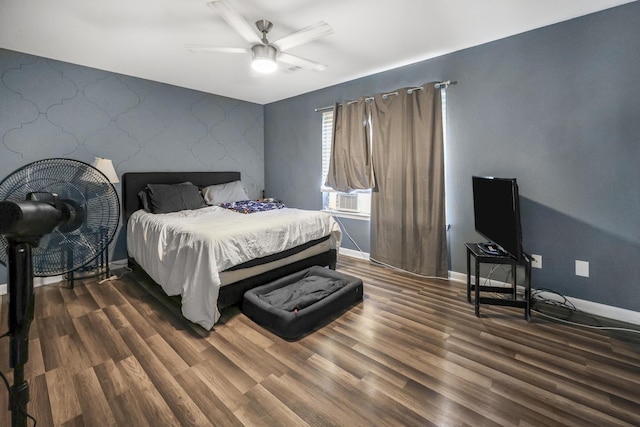 320 Marble Top Rd, Chickamauga, GA 30707 - bedroom with an accent wall, wallpapered walls, baseboards, dark wood-type flooring, and a ceiling fan