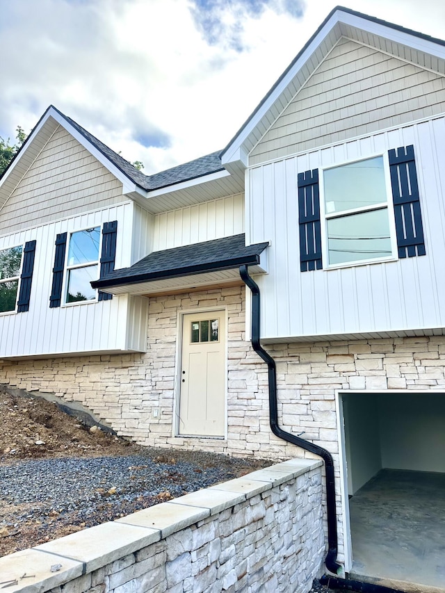 48 W Highland Dr Unit 25, Ringgold, GA 30736 - view of front of property with stone siding, an attached garage, and a shingled roof