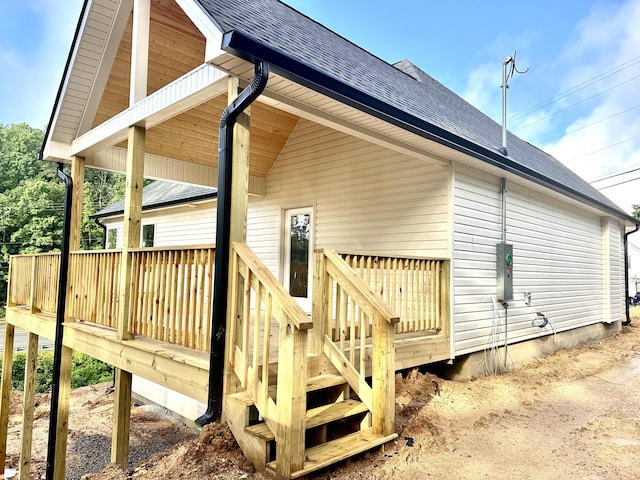 48 W Highland Dr Unit 25, Ringgold, GA 30736 - view of side of home featuring a shingled roof and a wooden deck