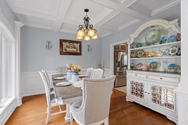 604 Lenna Ln, Dalton, GA 30720 - dining room with a chandelier, coffered ceiling, beam ceiling, light wood-style floors, and wainscoting
