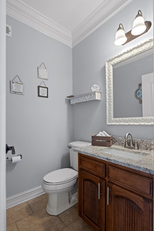 604 Lenna Ln, Dalton, GA 30720 - half bathroom with ornamental molding, vanity, toilet, tile patterned floors, and baseboards