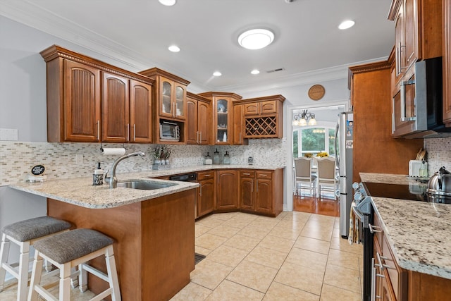 604 Lenna Ln, Dalton, GA 30720 - kitchen with appliances with stainless steel finishes, a sink, a peninsula, crown molding, and brown cabinets