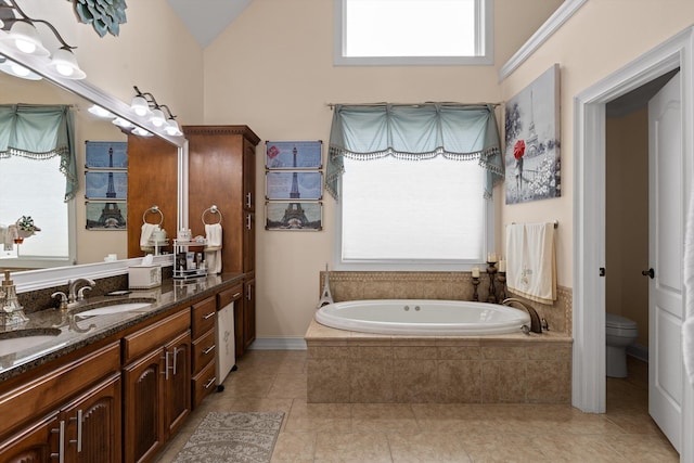 604 Lenna Ln, Dalton, GA 30720 - bathroom featuring double vanity, a garden tub, toilet, and tile patterned floors