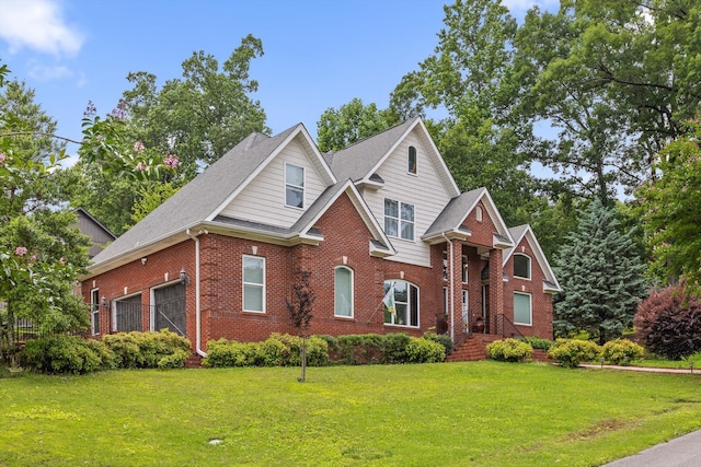 604 Lenna Ln, Dalton, GA 30720 - traditional home featuring brick siding, a front yard, a garage, and roof with shingles