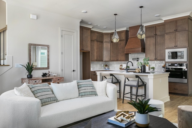 1522 Little Sorrel Rd Unit 034, Hixson, TN 37343 - living room featuring light wood-type flooring and crown molding