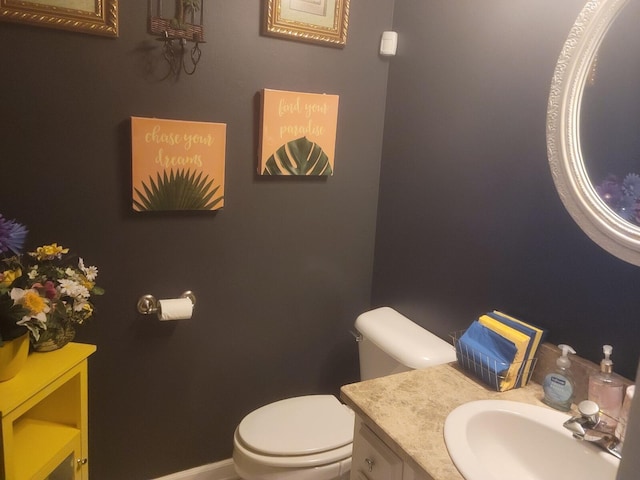 3415 Bennett Rd, Chattanooga, TN 37412 - bathroom featuring toilet, vanity, and baseboards