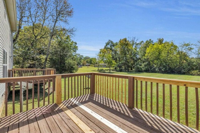 1770 Thrasher Pike, Hixson, TN 37343 - deck with a lawn and view of wooded area