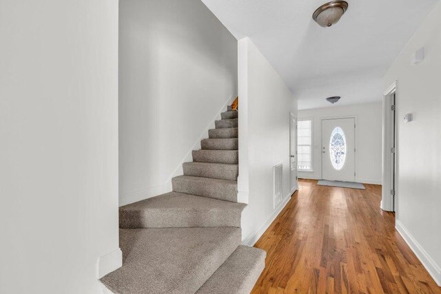 1770 Thrasher Pike, Hixson, TN 37343 - foyer entrance with stairway, wood finished floors, and baseboards