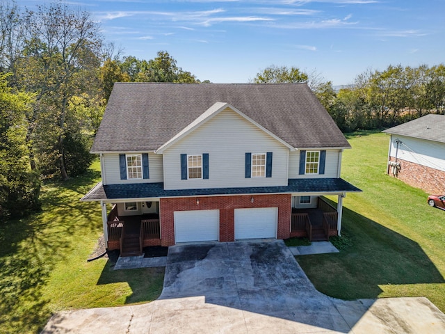 1770 Thrasher Pike, Hixson, TN 37343 - view of front of house featuring covered porch, concrete driveway, an attached garage, a front yard, and roof with shingles
