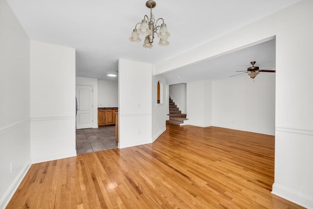 1770 Thrasher Pike, Hixson, TN 37343 - empty room featuring a chandelier, light wood-style floors, stairs, ceiling fan, and recessed lighting