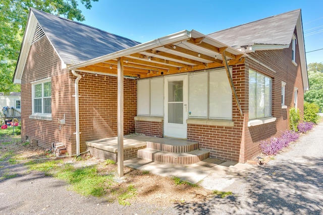 1615 Wilson Rd, Rossville, GA 30741 - view of front of home featuring brick siding and roof with shingles