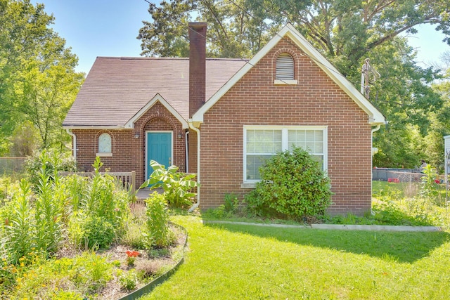 1615 Wilson Rd, Rossville, GA 30741 - view of front of property with brick siding and a chimney