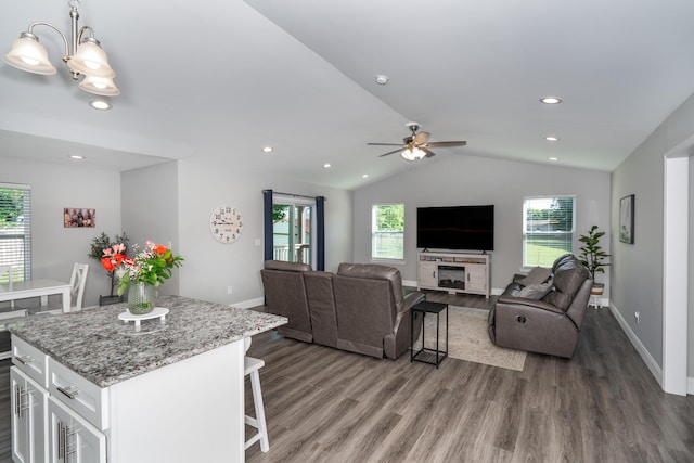 595 New Union Cir, Dayton, TN 37321 - living area with healthy amount of natural light, wood finished floors, lofted ceiling, baseboards, and recessed lighting