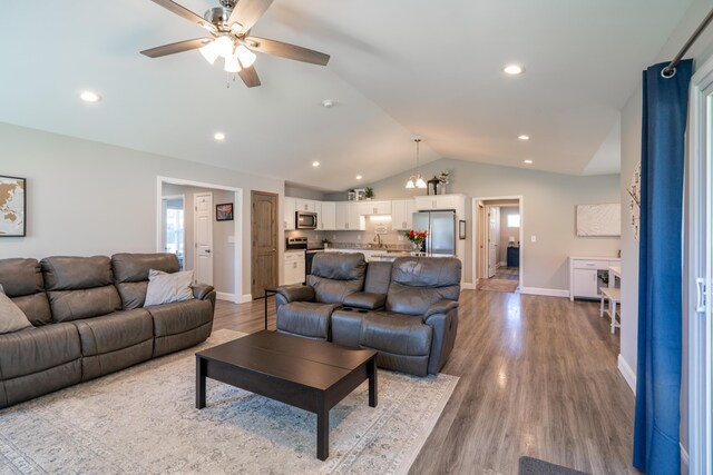 595 New Union Cir, Dayton, TN 37321 - living room featuring vaulted ceiling, ceiling fan, light wood-type flooring, baseboards, and recessed lighting