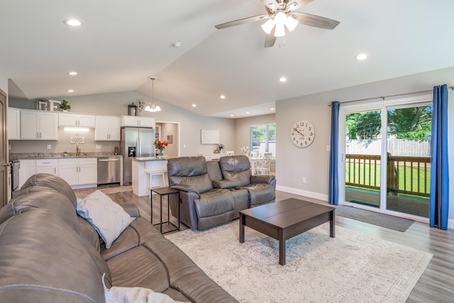 595 New Union Cir, Dayton, TN 37321 - living area with lofted ceiling, a chandelier, ceiling fan, light wood-type flooring, and recessed lighting