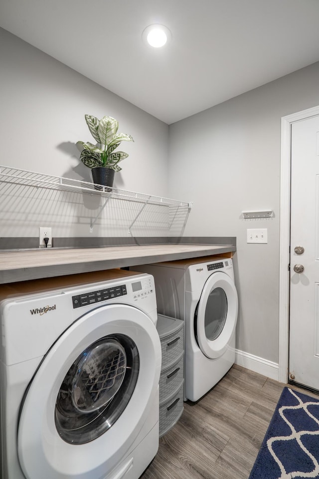 595 New Union Cir, Dayton, TN 37321 - laundry area with washer and clothes dryer, wood finished floors, and baseboards